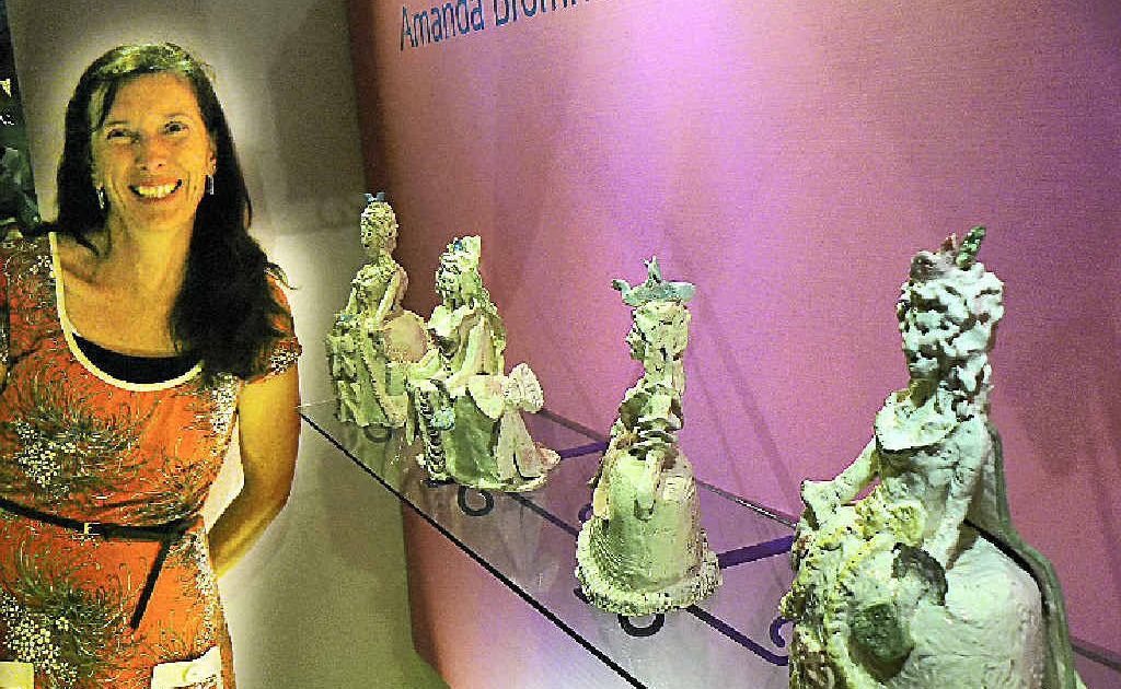 ART AT HEART: Amanda Bromfield poses with her ceramic sculpture display now on show at the Carrington Street end of the Star Court Arcade. ART AT HEART: Amanda Bromfield poses with her ceramic sculpture display now on show at the Carrington Street end of the Star Court Arcade.
